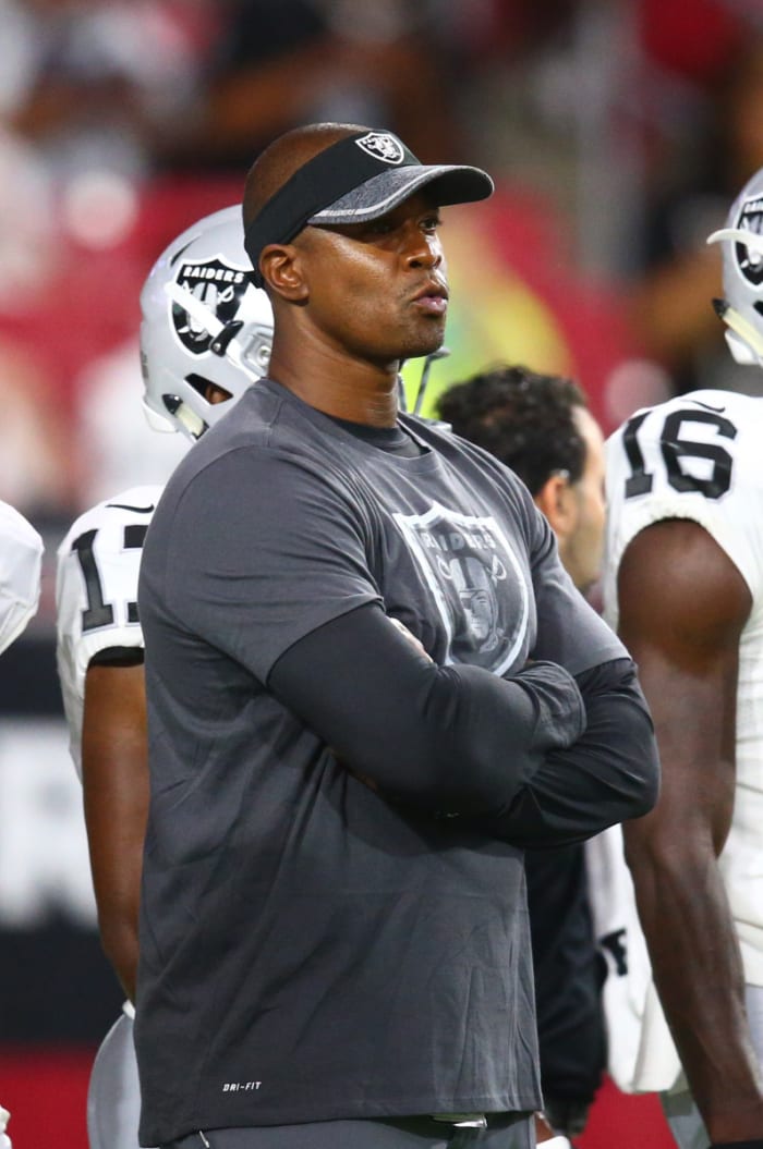 Raiders assistant coach Rob Moore watches his team play against the Cardinals during a 2016 preseason game. Moore is among the most significant receivers in Cardinals history.